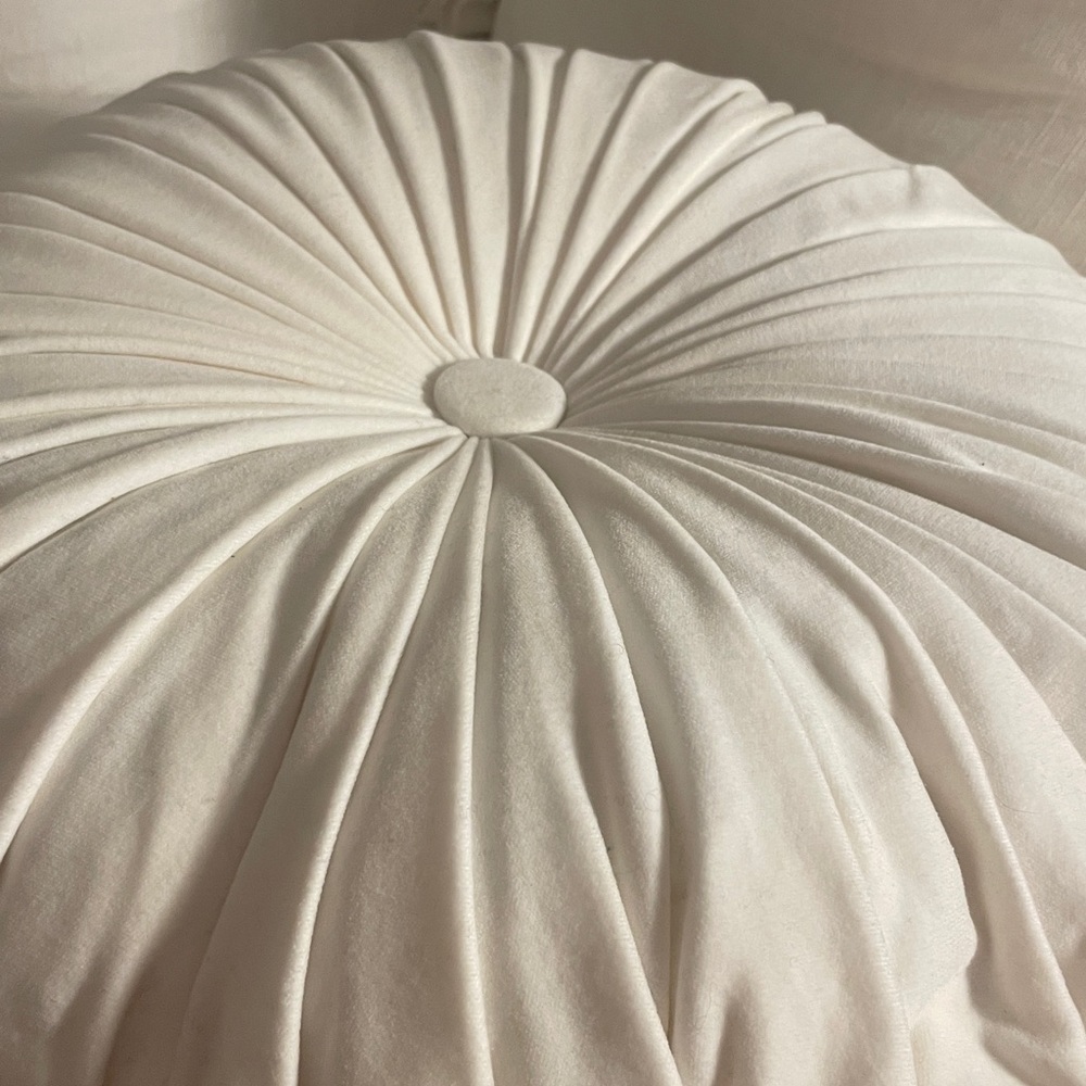 Round white velvet tufted pillow